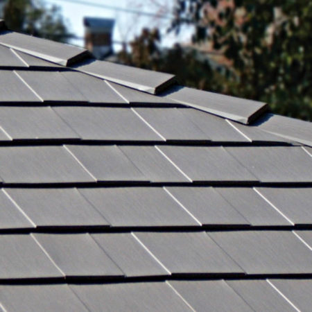 Metal roof panels and ridge close up